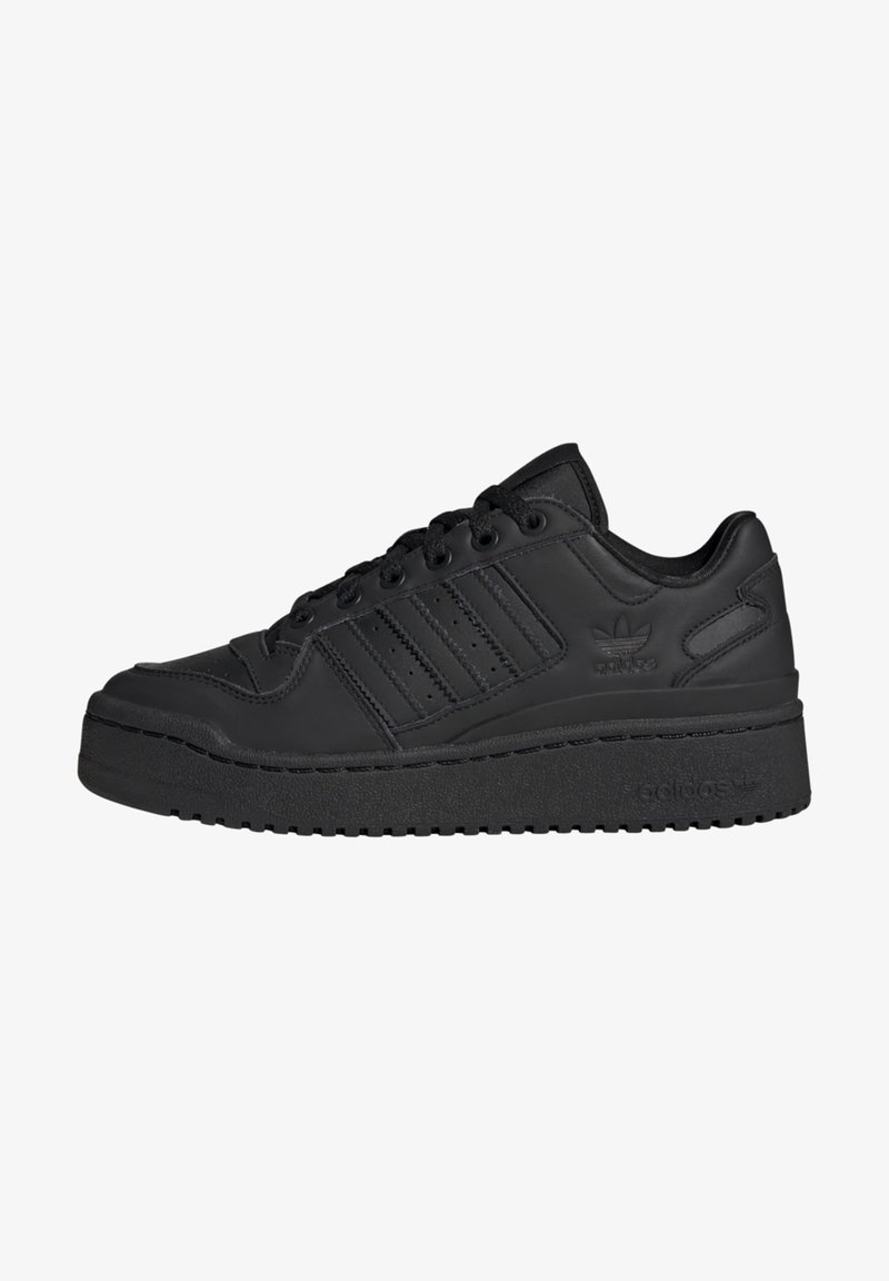 Black sneaker with a smooth leather upper, featuring three side stripes, a thick textured sole, and padded collar for support.