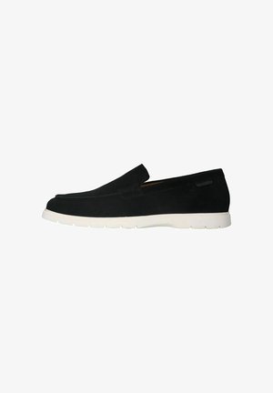 Black slip-on shoe made of suede with a smooth texture, featuring a white rubber sole, rounded toe, and minimalistic design.