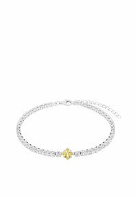 Pulsera de tenis de plata con piedras redondas transparentes y una gema central en corte cuadrado amarillo, con cierre y cadena ajustable.