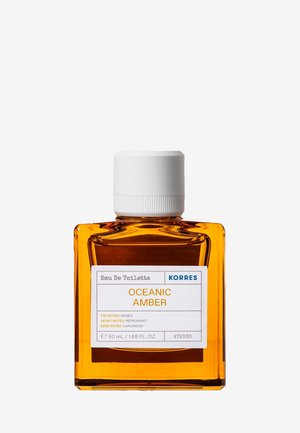 Bernsteinfarbene Korres Oceanic Amber Eau de Toilette Flasche mit weißem Verschluss und Etikett, das Duftnoten und Volumen zeigt.
