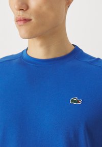 Lacoste Sport CLASSIC - Basic T-shirt - ladigue