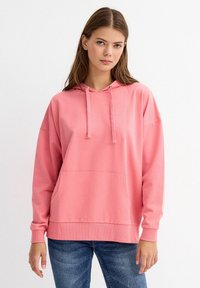 Sudadera con capucha rosa, con un bolsillo frontal, mangas largas y puños acanalados. Fabricada con un tejido suave y ligero, con un ajuste relajado.