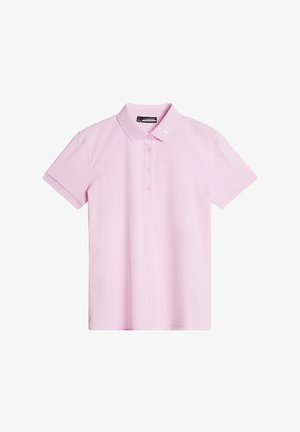 Koszulka polo w jasnoróżowym kolorze, z krótkim rękawem, klasycznym kołnierzykiem, zapinana na guziki z przodu oraz subtelnym logo na lewym ramieniu w białym kolorze.