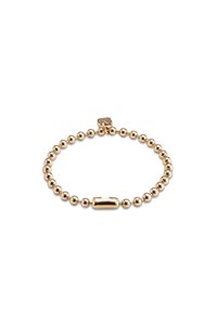 Bracelet en perles dorées avec des perles rondes et un fermoir rectangulaire. Texture lisse avec une finition polie, créant une surface réfléchissante.