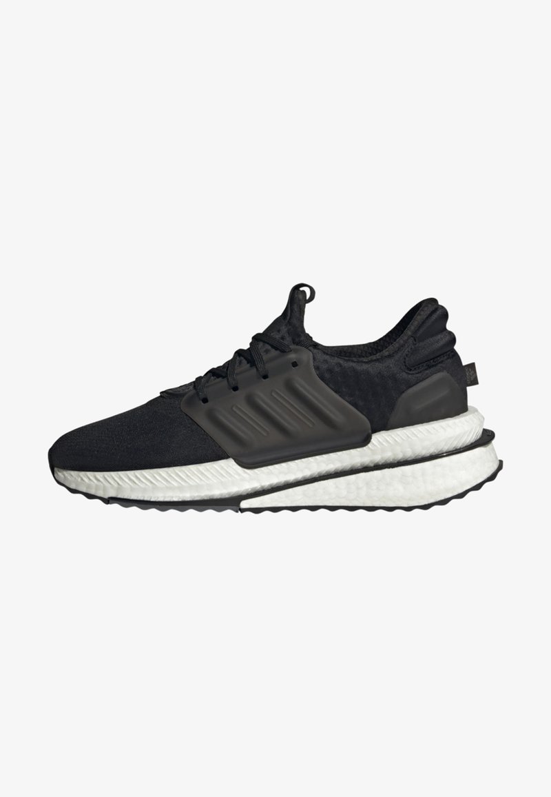 Baskets de sport noires avec semelle blanche amortie, côtés texturés, lacets et languette au talon, vues de profil.