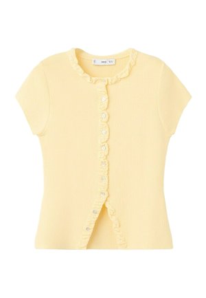 Krátky rukáv bledozltý pletený top s volánikovým lemom pozdĺž zapínania na gombíky a výstrihu, s malými bielymi gombíkmi vpredu.