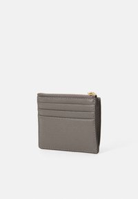 Gray leather cardholder with three card slots on one side and a zippered compartment on top, against a white background.