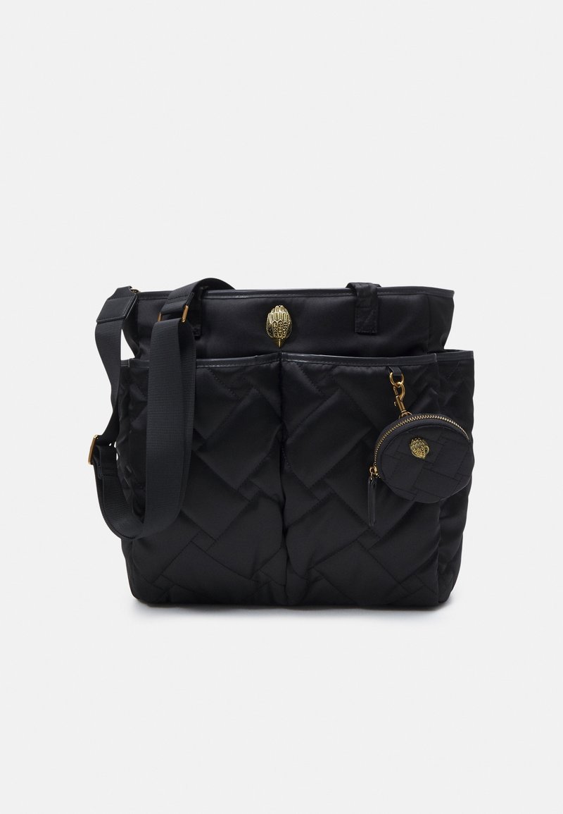 Black quilted tote bag with a structured shape, featuring a gold hardware accent and a detachable coin pouch. Textured nylon material.