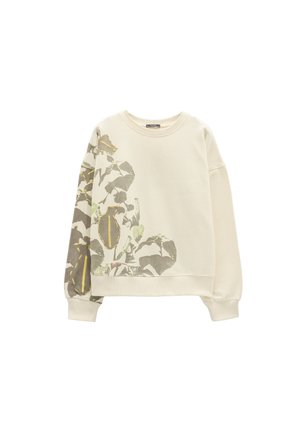 Ecru bluza dresowa z nadrukiem liści i owoców inspirowanych naturą na lewym rękawie i dolnej części przodu, z delikatnymi żółtymi przeszyciami.