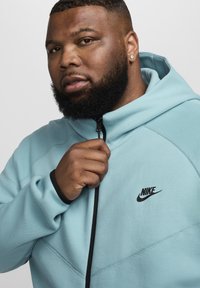 Nike Sportswear TECH - Zip-up sweatshirt - denim turquoise black