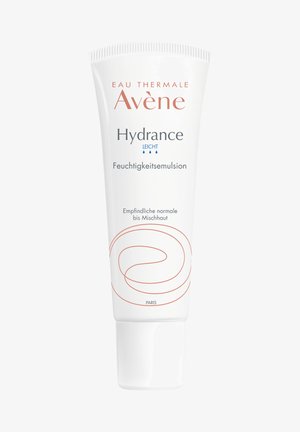 Avène Hydrance Light moisturizing emulsion tube for sensitive normal to combination skin, white with minimal orange spiral design.
