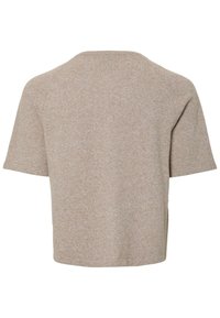 Camisa bege de mangas curtas com um corte relaxado, feita de um tecido de malha texturizado. Design simples com um decote arredondado e sem fechos visíveis.