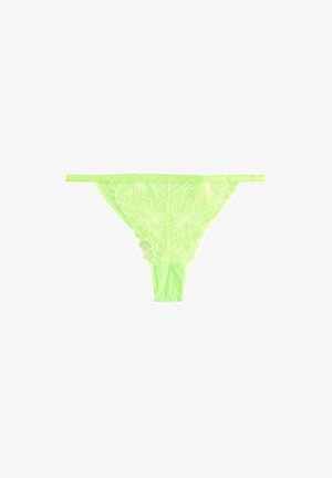 String vert néon avec broderie florale, en tissu en maille transparente, avec des bretelles latérales fines et une texture lisse.