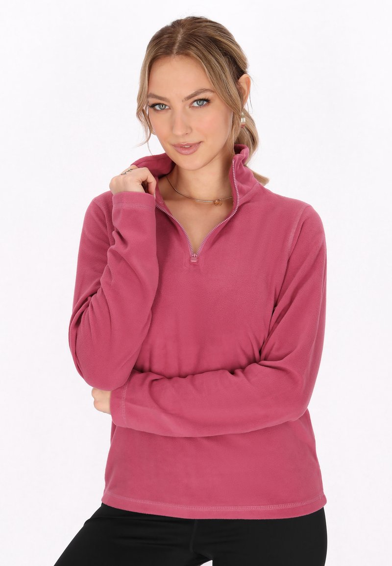 Fleece pullover in roze met een halve rits, lange mouwen en een zachte textuur. Heeft een licht verhoogde kraag. Eenvoudig, casual ontwerp.