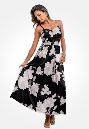 Czarna sukienka maxi w kwiaty z jasnoróżowymi wzorami piwonii, dopasowanym gorsetem, regulowanymi ramiączkami spaghetti i zwiewną spódnicą. Gładka faktura tkaniny.