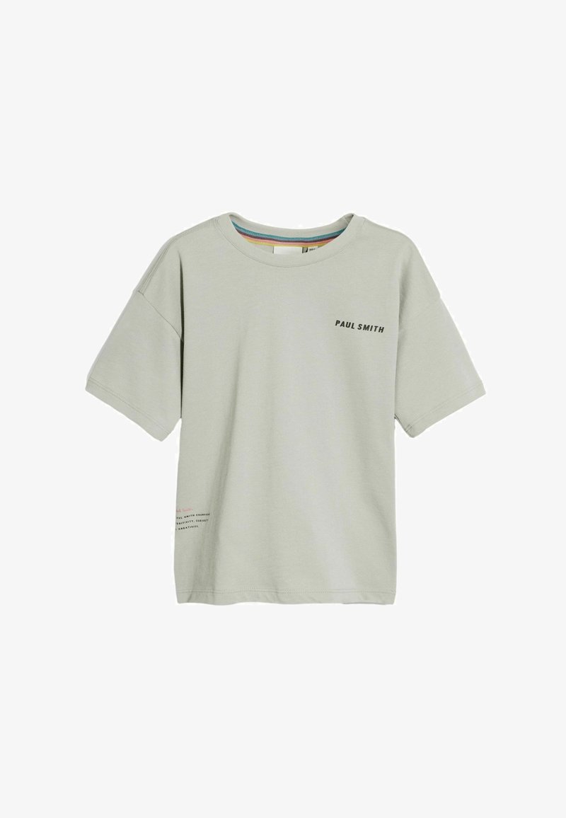 Šviesiai pilka medvilnės marškinėliai su laisvu siluetu, apvaliu iškirpimu ir trumpomis rankovėmis. Priekinėje pusėje yra juodu tekstu parašyta "PAUL SMITH".