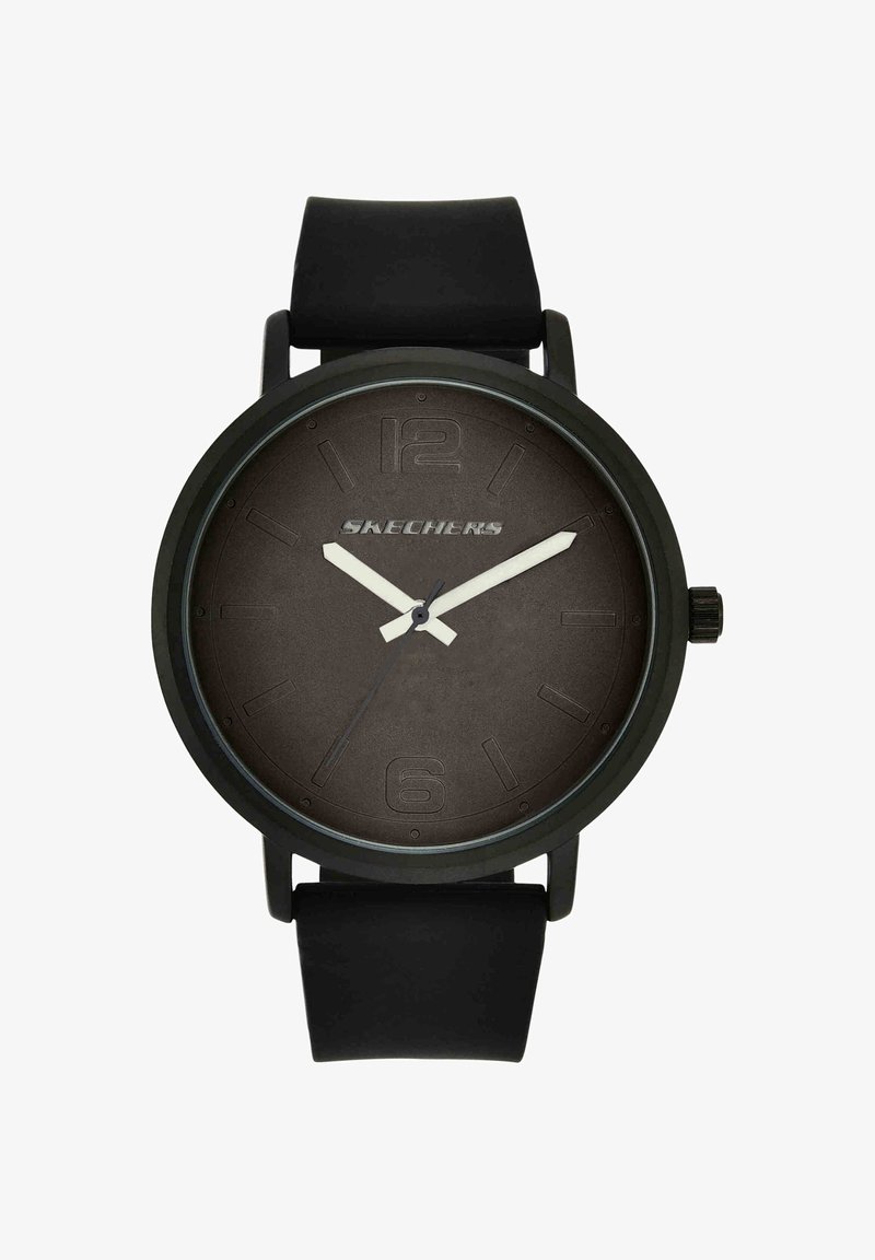 Montre-bracelet Skechers noire avec cadran sombre, aiguilles des heures et des minutes blanches, marqueurs en relief aux 12 et 6, et bracelet en silicone noir, affichant 10h10.