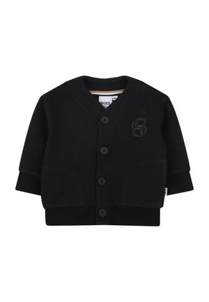 Cardigan noir avec un col en V, fermeture à boutons et logo brodé sur la poitrine. Fabriqué en tissu lisse avec des manches longues et des poignets côtelés.