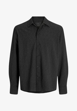 Camicia nera a maniche lunghe con un motivo tessile, chiusura a bottoni sul davanti, colletto a punta e orlo dritto. Realizzata in un tessuto leggero.