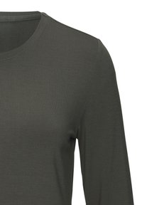 Langsleeve, ronde hals top in donkergroen, gemaakt van een zachte, geribde stof. Kenmerkt een slim fit en minimale naden voor een gladde afwerking.