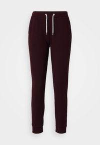 JOGGERS - Tracksuit bottoms - dark red