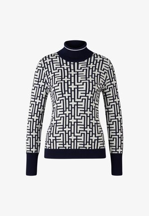 Námořnicky modrý a krémový rolák se geometrickým vzorem, s žebrovanými manžetami a límcem, vyrobený z měkkého pleteného materiálu.