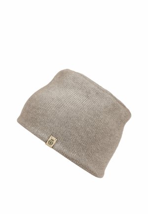 Light brown knitted beanie with a small beige tag featuring a crown logo on a white background.