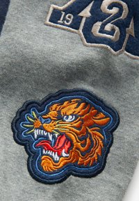 Next ALL-IN-ONE.  - REGULAR FIT - Pizsamák - navy blue varsity badges