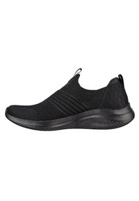 Zapatilla deportiva negra con parte superior de tejido transpirable, diseño sin cordones, acabado texturizado y suela de goma flexible para comodidad y agarre.