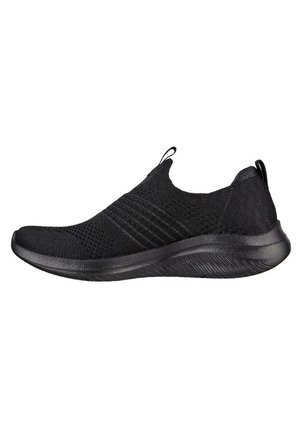 Zapatilla deportiva negra con parte superior de tejido transpirable, diseño sin cordones, acabado texturizado y suela de goma flexible para comodidad y agarre.