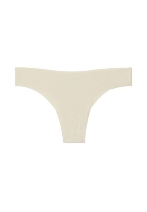 Tanga beige hecho de un suave tejido acanalado. Presenta un diseño de talle bajo con un estilo minimalista y bordes suaves.