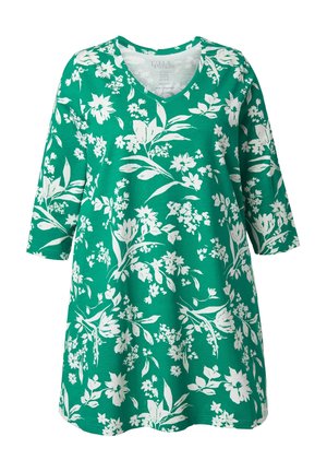 Vestido túnica verde con estampado floral, escote en V, mangas tres cuartos y patrones botánicos blancos sobre una tela suave y lisa.