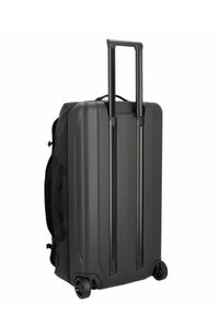 Dark gray hardshell suitcase with a textured surface, two inline wheels, a telescoping handle, and side carrying handles.