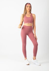 Carlheim Leggings - Byxor - berry