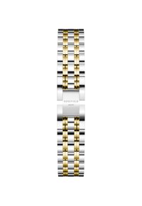 Correa de reloj de metal en tonos plateado y dorado con eslabones alternos, que presenta un acabado cepillado y acentos pulidos. Logo grabado en el cierre.