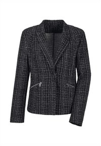 Blazer tissé noir et blanc avec une finition texturée, revers crantés et deux poches zippées à la taille. Coupe ajustée.