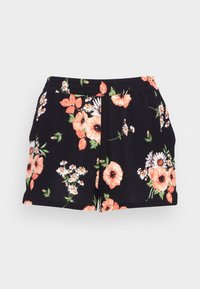 Shorts noirs avec taille élastique présentant un motif floral de fleurs et feuilles pêche, blanches et vertes dispersées sur le tissu.