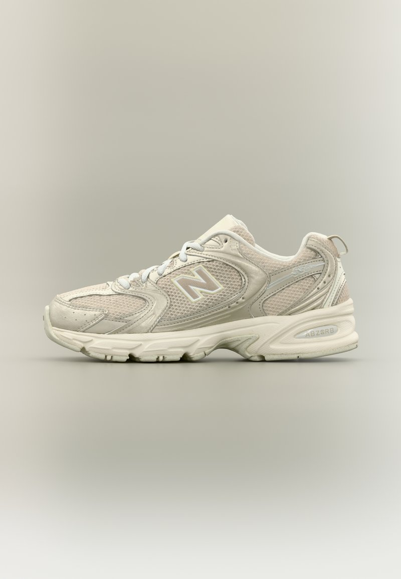 U530 gold-coloured metallic/gold-coloured