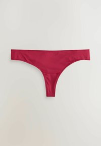 Red satin thong with a smooth texture, featuring a minimal design and narrow sides, suitable for discreet wear under clothing.
