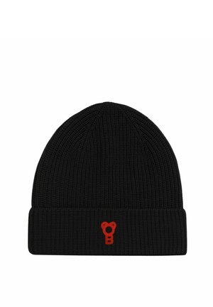 Bonnet noir tricoté avec un revers plié présentant un petit logo rouge brodé en forme de clé stylisée ou de tête d'ours.