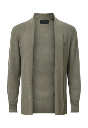 Cardigan ouvert en tissu côtelé vert olive. Dispose de manches longues et d'une coupe décontractée. Aucun fermoir visible ni motif.