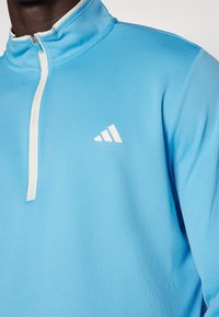 adidas Golf LIGHTWEIGHT HALF-ZIP - Jumper - semi blue burst