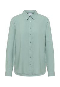 Chemise à manches longues vert clair avec col pointu et manches boutonnées, étiquetée Cecil.