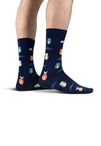 Tengerészkék zoknik, baglyos mintával narancssárga, zöld és kék színekben. Bordás szegéllyel és puha anyagból a kényelem érdekében.