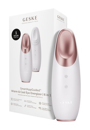 Kompakt hvid og rosagulds øjemassagerenhed med sol- og snefnugsikoner, vist ved siden af sin hvide detailæske med produktdetaljer.