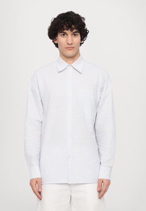 Striped button-up shirt in light blue and white, with a collar, single chest pocket, and long sleeves featuring buttoned cuffs.