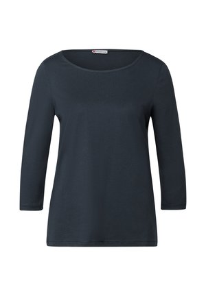 Top lungo a maniche con collo rotondo in un blu navy scuro, dal taglio morbido. Realizzato in cotone liscio, senza fantasie o decorazioni.