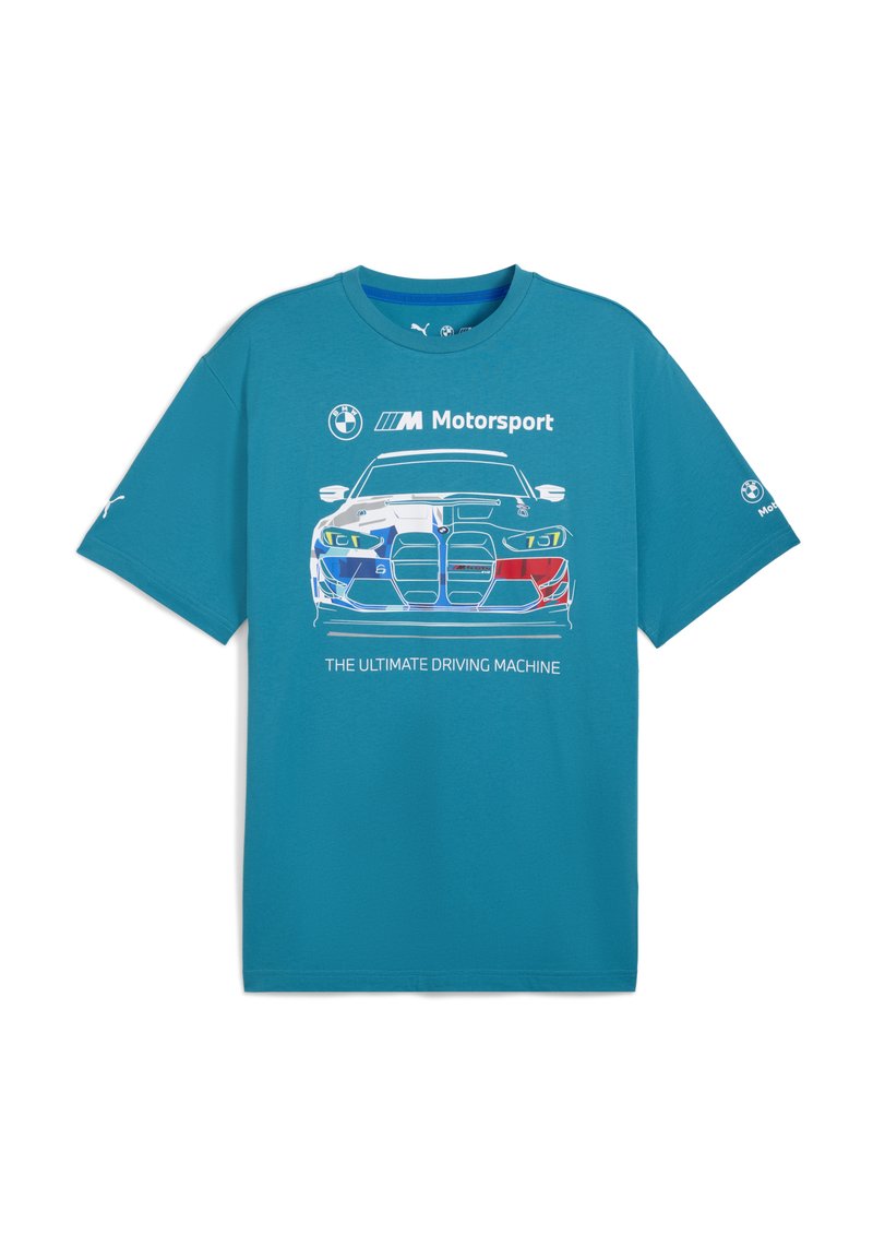 Mėlyna marškinėlių su grafika, vaizduojančia BMW automobilį, su užrašu "ULTIMATYVUS VAŽIAVIMO ĮRENGINYS" ir "M Motorsport" ryškiai išreikštu.