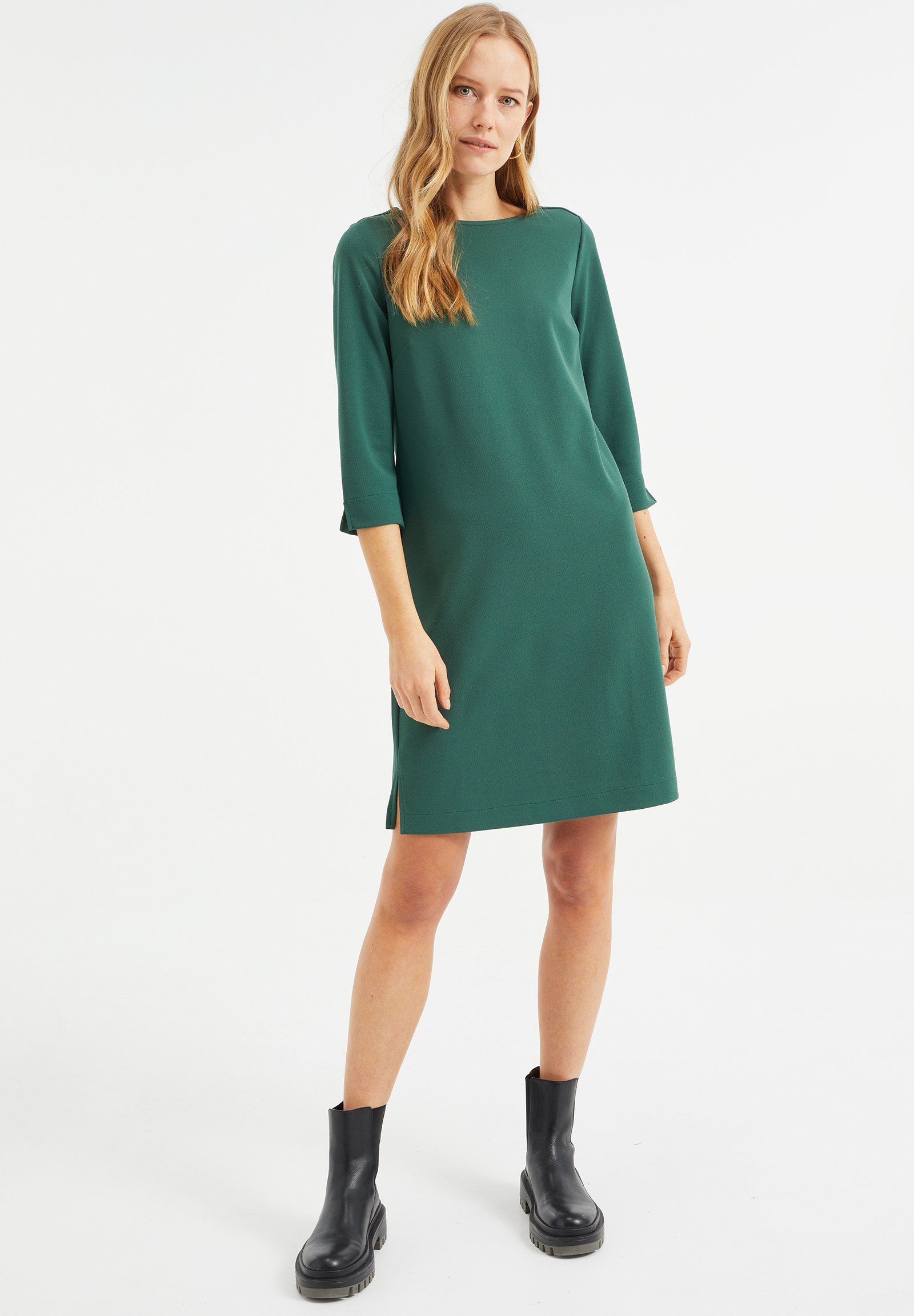 grof gebreide roze trui