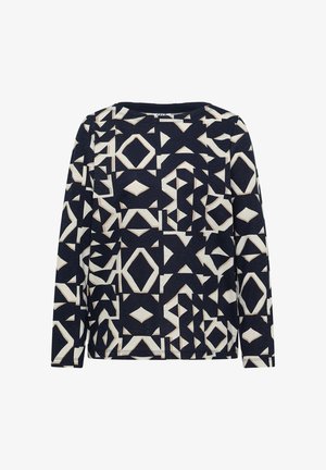 Camisa de manga larga azul marino con un patrón geométrico abstracto en blanco y beige, que presenta diamantes, triángulos y cuadrados.